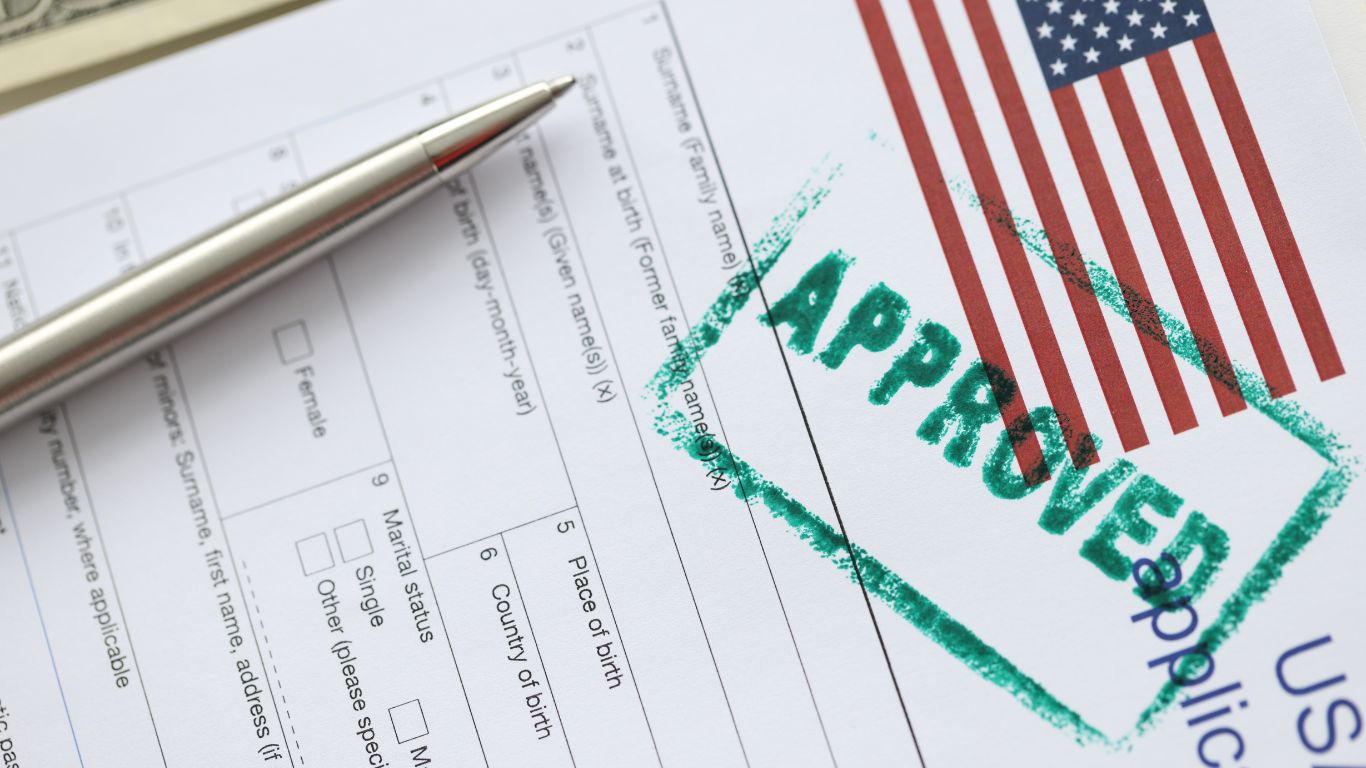 U.S. Registration form with American flag and approved stamp.