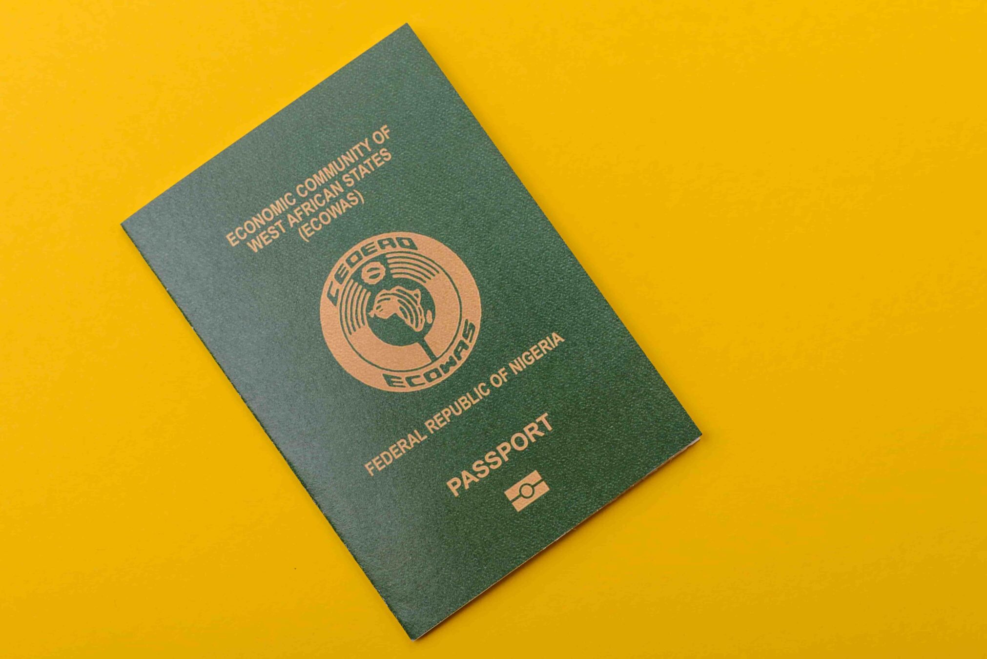 A picture of the Nigeria passport on a yellow background