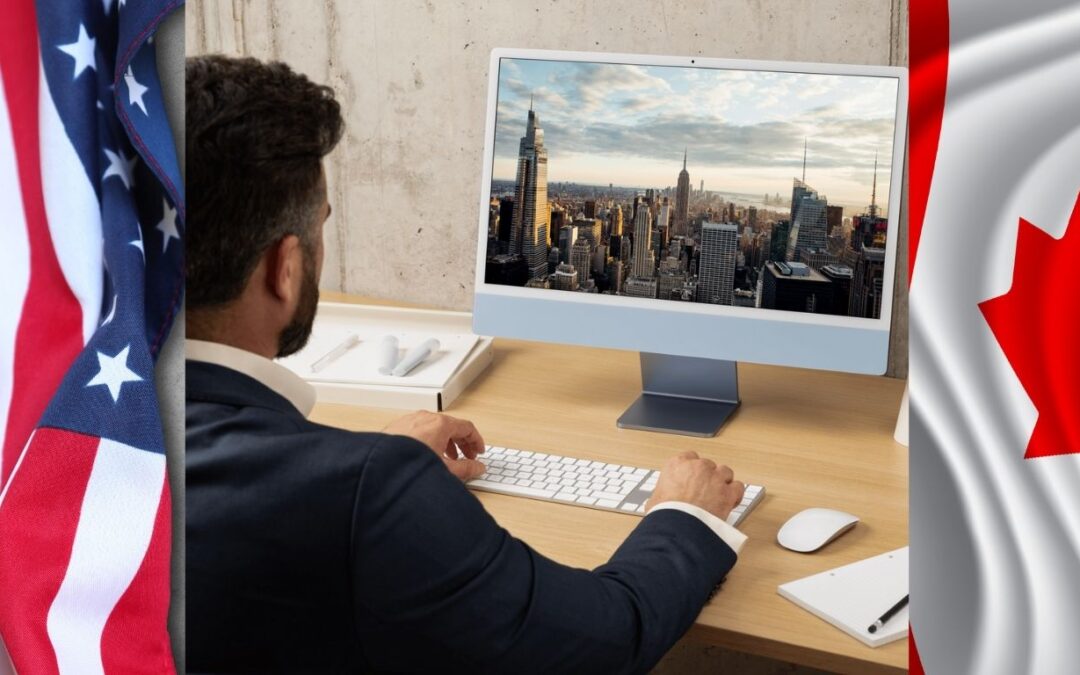 business person looking at a computer screen of a city with a Canada and USA flag